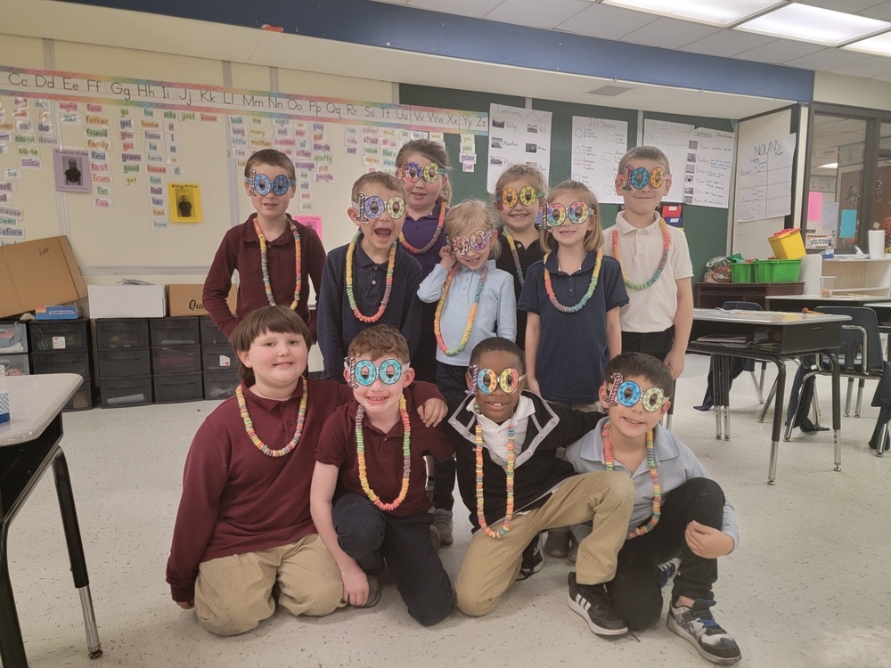 first grade with 100 day themed glasses 
