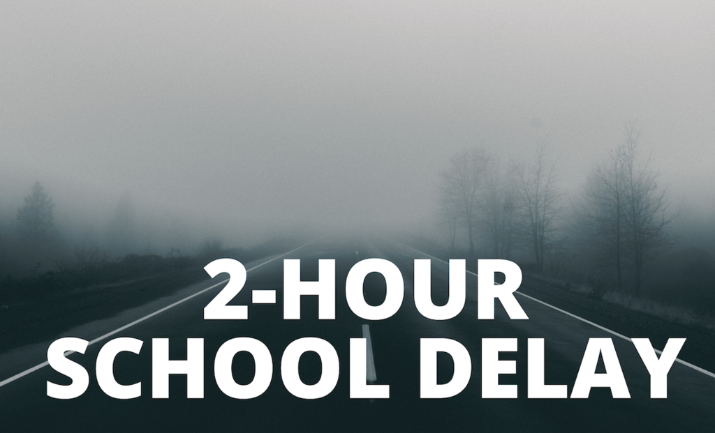 foggy road with text that reads 2-hour school delay