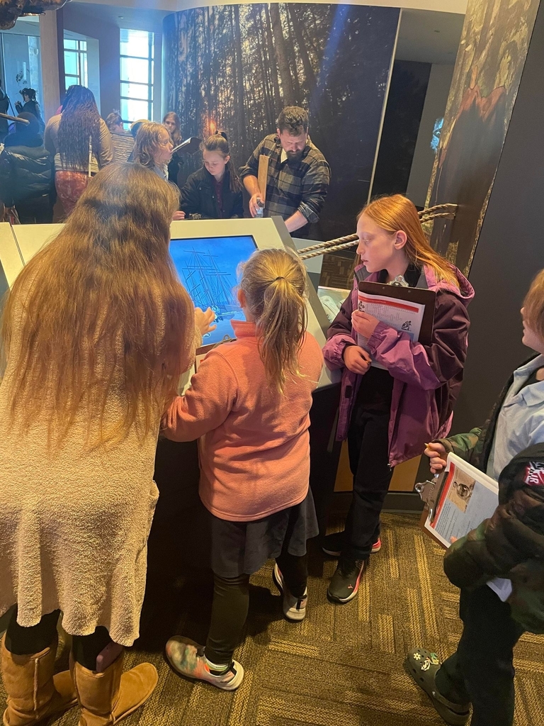 students viewing exhibit 