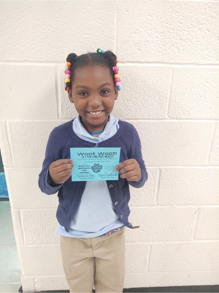 girl smiling with certificate 